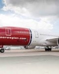 Norwegian flyr  langt  med fulle  fly og  fornøyde  passasjerer( Foto: Norwegian)