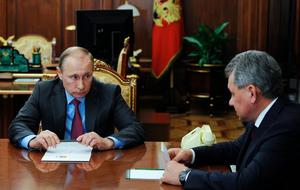 Vladimir Putin and Sergey Sojskyn netitiate about Syria( Photo: Ap)