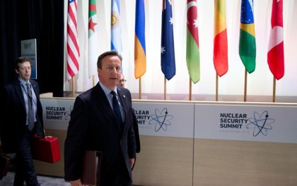 British Prime Minister David Cameron, right, arrives for the afternoon plenary session of the Nuclear Security Summit, Friday, April 1, 2016 in Washington( Photo: Associated Press).