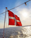danish flag waving on the ship rope