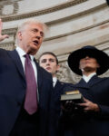 Donald Trump is sworn in as the 47th president of the United States by Chief Justice John Roberts as Melania Trump holds the Bible during the 60th Presidential Inauguration in the Rotunda of the U.S. Capitol in Washington, Monday, Jan. 20, 2025. (AP Photo/Morry Gash, Pool)